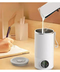 Grab And Go Heated Self Stirring Mug Electric Magnetic Mixing Travel Cup Rechargeable Stainless Steel Coffee And Tea Warmer on desk