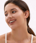 Six Pairs 14K Gold Plated Stud Earrings For Women With Hypoallergenic Cuff Cartilage Styles, Multi Piercing Friendly Dainty Stackable Set, Includes Tiny Hoops And Ball Earrings, Your Go To Gift Jewelry For Everyday Wear, model wearing gold ear stack