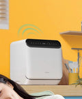 Plug And Play Countertop Dishwasher Totally Hassle Free Setup Triple Bowl Basket An Absolute Game Changer For Apartment Living And Micro Kitchens Fully Auto Compact Must Have placed on a kitchen countertop.