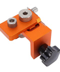 Rock Solid Double Hole Drilling Positioner With 12mm Eccentric Nut Drill Guide, orange aluminum clamp for precise alignment.