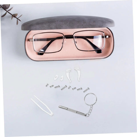 Eyeglass Repair Kit With Precision Screwdriver Set Sunglass Screws Replacement Nose Pad Cushions Tweezers And Storage Case For Quick Eyewear Fixes While Traveling displayed with accessories.