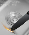 Professional grade wall mounted kitchen faucet with filter rustproof and wear resistant ideal for indoor and outdoor use combining durability and style for home cooking enthusiasts close-up of a knife sparking on a stainless sink surface.