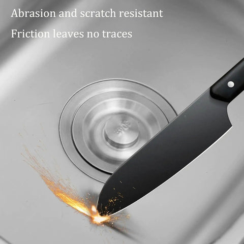 Professional grade wall mounted kitchen faucet with filter rustproof and wear resistant ideal for indoor and outdoor use combining durability and style for home cooking enthusiasts close-up of a knife sparking on a stainless sink surface.