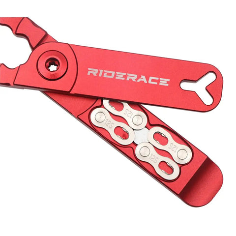 Five In One Chain Link Pliers For Bicycles With Built In Tire Lever And Installation Aid CNC Machined Aluminum Ultra Lightweight At Thirty Seven Grams Integrated Storage Slot For Spare Chain Links A Must Have On The Go Bike Tool in red, showing storage slot for spare chain links.