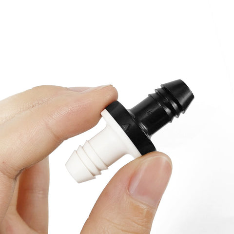 Three Eighth Inch Inline Vacuum Barbed Check Valve One Way Breather For Fuel Gas Liquid Air held in hand, showing ABS shell