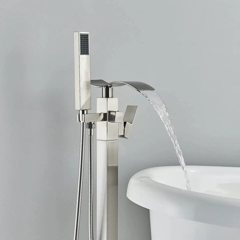 Floor Mounted Tub Filler Faucet With Handheld Sprayer And Waterfall Spout, Free Standing Tub Mixer Tap In Brushed Nickel next to tub