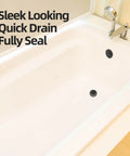 Oil Rubbed Bronze Tub Drain Kit With Hair Catcher And 2 Hole Overflow Faceplate in bathtub, showing drain and overflow cap