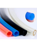 Various air compressor hose tubes in vibrant colors, including a blue PU air compressor hose tube featuring slick flexible spring coil build.