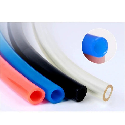 Various air compressor hose tubes in vibrant colors, including a blue PU air compressor hose tube featuring slick flexible spring coil build.