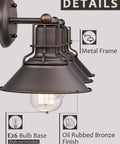 Industrial 3 Light Vanity Light In Oil Rubbed Bronze For Bathroom Wall Sconce with visible metal frame and E26 bulb base.