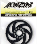 Spur Gear TCS V2 64P 112T in packaging, black gear with multiple holes, labeled for RC and robotics use