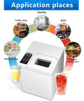 No Fuss Countertop Ice Maker Rolling Out Rapid Chill With Fifteen Kilos Daily Output And Snappy Nine Cube Runs shown in coffee shop setting.