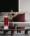 Jellyfish Lamp With Bluetooth Speaker And White Noise Night Light For Kids And Adults on modern table in living room setting.