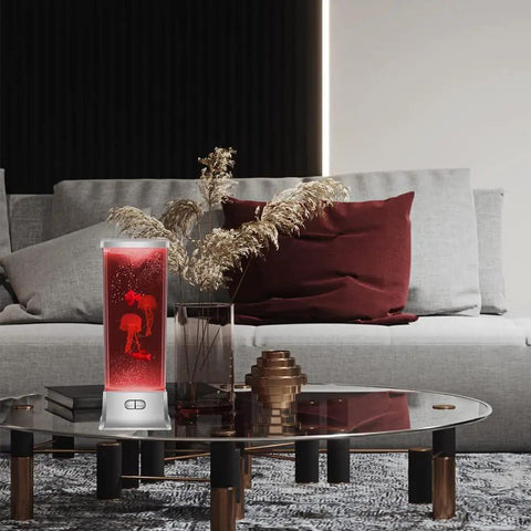 Jellyfish Lamp With Bluetooth Speaker And White Noise Night Light For Kids And Adults on modern table in living room setting.