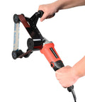 Hand holding Top Shelf Heavy Duty Pipe And Tube Polisher With Fifty Sanding Belts 800W Variable Speed Motor, perfect for rust removal.