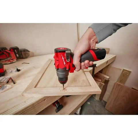 Badass M12 Compact Drill Driver With Knockout 400 Inch Pound Torque Rock Solid All Metal Chuck Gearcase Built In Low Light Led Bare Tool Kit Without Battery Or Charger For Weekend Pros used to drill wood.