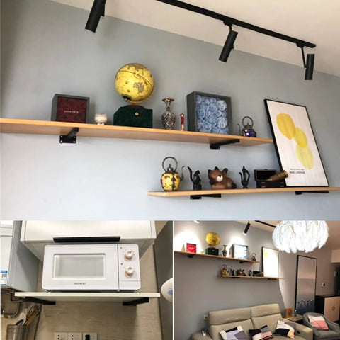 Heavy Duty Black Floating Shelf Brackets 30 Cm Wide Solid Iron Wall Supports holding decorative items on wooden shelves.