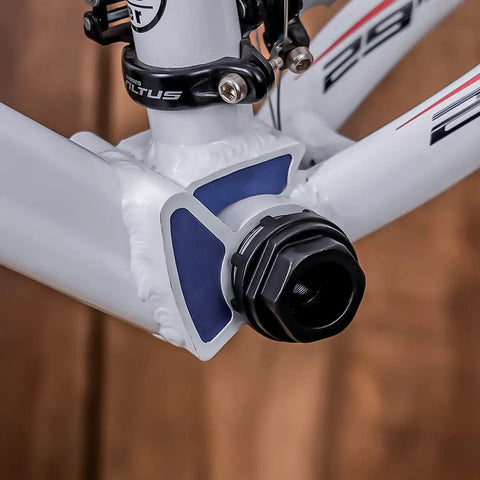 Close-up of a bicycle frame with attached Eight Notch Cartridge Bottom Bracket Lockring Tool 44mm OD Pro Grade Gearhead Favorite Install Remover
