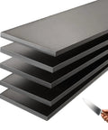 Stack of 1095 High Carbon Steel Knife Making Flat Bar 12 By 1.5 By 0.12 Inch Annealed Pack Of 5 with knife in hand