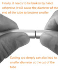 Close-up of hands holding a small silver brake-line tube with a split end, illustrating flare tool use.