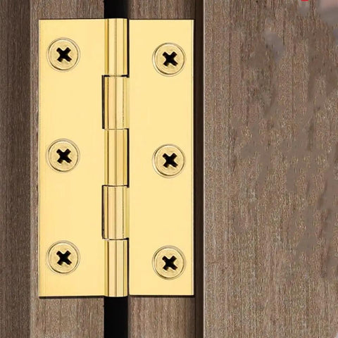 Four Pack Heavy Duty Solid Brass Butt Hinges For Cabinet Doors And Furniture With Rich Gold Finish And No Sweat Mounting Kit, close-up view.