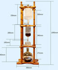 Slick Cold Brew Coffee Tower Featuring A Reliable Ice Drip System For Bold Flavor Kick Holds A Humongous 3000ML Glass Jar Settled On A Raw Brown Wood Stand Perfect For Patio Hangouts Or Friday Night House Vibes dimensions shown with measurements.