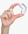 Hand holding clear acrylic piece of Dope Clear Acrylic Skateboard Wall Mount Hanger For Display And Storage Of Decks And Longboards.