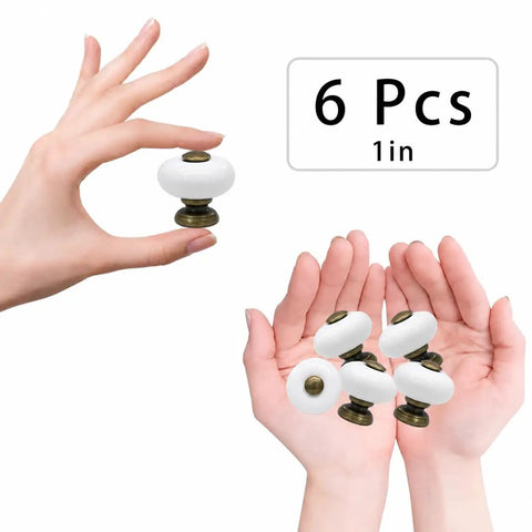 Six Pack Ceramic Cabinet Knob Set 1 Inch Round Drawer Pulls In Antique Bronze Finish held in hand.