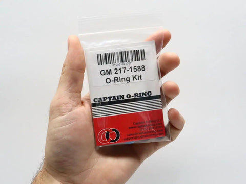 Hand holding Fuel Injector O Ring Seal Kit 217-1588 Replacement For GM Vehicles package