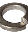 Close-up of a single 316 Stainless Steel Split Lock Washer 3/8 Inch showing its spring action coil, ideal for marine hardware.