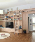 Rock Solid Sliding Barn Door Hardware Kit Featuring Adjustable Rails Smooth Rolling Carriages And Sturdy Floor Guides for custom ladder shelving in a living room.