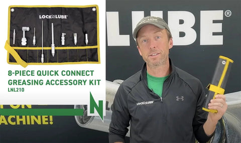 LockNLube 8-piece quick-connect greasing kit in black rip-stop case with yellow trim; man holding a tool.