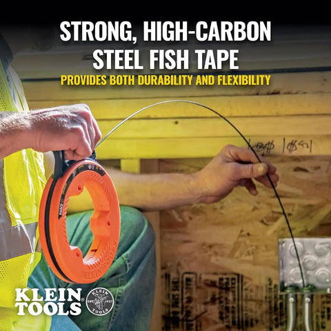 Person using 50 Foot Electrical Fish Tape Pro Grade With Steel Wire Puller, Double Loop Tip, for wiring installation in construction.