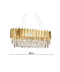Slick Gold Metal LED Pendant Light With Real K9 Crystals For Dining Room And Kitchen, 60cm wide, gold with crystal accents.