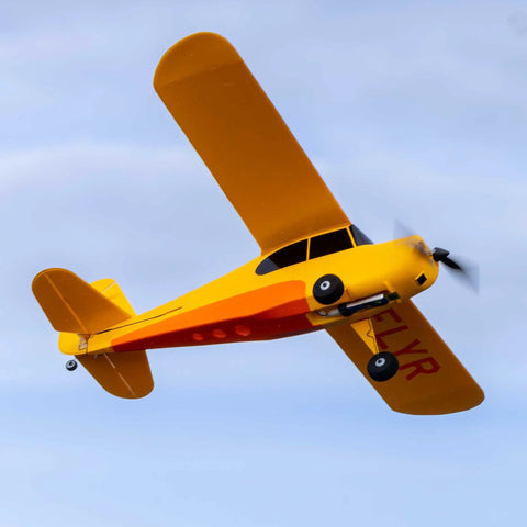 Champ Anniversary Edition 515mm RC Trainer Airplane BNF Basic with Safe Select in flight, factory preassembled, yellow design.