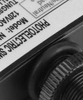 Close-up of Automatic Dusk To Dawn Photocell Switch With 120VAC Light Sensor detailing model NK-101A for indoor or outdoor use