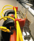 Yellow cables organized with Black Wire Loom Kit 42502 for automotive wiring protection and cable management in engine bay.