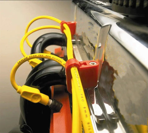 Yellow cables organized with Black Wire Loom Kit 42502 for automotive wiring protection and cable management in engine bay.