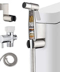 Handheld Bidet Sprayer Must Have With 2 Replacement Filters For Toilet And Feminine Wash Cloth Diaper Washer Stainless Steel Adjustable Water Pressure Four Foot Hose Set In Brushed Nickel attached to a toilet.