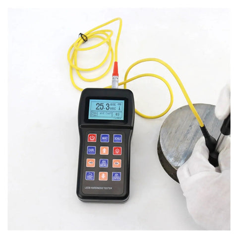 Top Shelf Digital Hardness Tester Portable Handheld Metal Gauge measuring hardness of a metal sample using a probe.