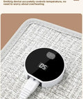 Close-up of control panel for Cozy Up With Under Desk Leg Warmer Heater Delivering 360 Degree Full Leg Heating, portable.