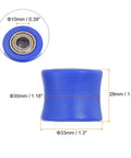 Close-up of Bombproof 10mm Nylon Chain Roller Tensioner Slider Kit For Mini Motorcycle Dirt Bike ATV Go Kart, blue with bearings.