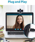Hella Crisp 1080P USB Web Camera With Integrated Mic And Handy Privacy Flip on laptop with smiling user in video call.