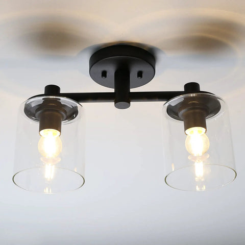 2-Light Industrial Glass Shade Semi Flush Mount Ceiling Fixture For Hallways, Kitchens, Lofts, And Bars - Dope Vintage Modern Chandelier Style Over Counters And Islands displaying clear glass shades and black metal base