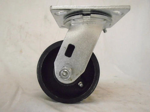 Side view of 4x2 in swivel caster with 7/8 in V-groove iron/steel wheel and mounting plate