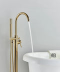 Gold Polished Freestanding Bathtub Faucet Floor Mount Tub Filler With Hand Shower Mixer Taps High Flow in modern bathroom