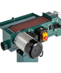 Close-up of Hardbody 4X48 Inch Dual Wheel Metal Belt Grinder And Shop Sander in glossy black, showing motor and sanding belt.