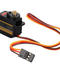 Tough As Nails Micro Servo Motor Kit With Full Metal Gears And Whisper Quiet Operation Slick Upgrade For Axial SCX24 RC Crawler Project Providing Smooth Steering And Sweet Reliability In Fire Red, showing servo motor with wires.