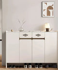 White cabinet with Set Of 4 Vintage Drop Bail Pulls Cabinet Handles Antique Bronze for kitchen cabinets and furniture.
