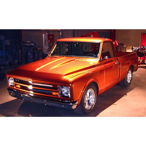 Chevy 1967 CK Pickup Truck Copper Orange Metallic Stacey David's Copperhead One Sixty Four Scale Diecast Model Car in garage